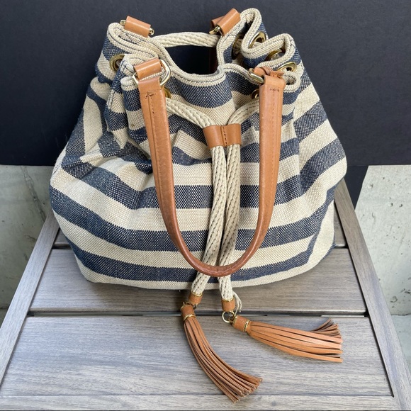 UGG Handbags - UGG Striped Canvas draw string bag leather straps